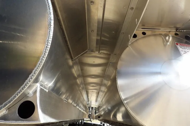 Slide: The Image of Underneath view of 2026 Bennington M Swingback 26 MSB pontoon boat, showcasing aluminum structure. - 49