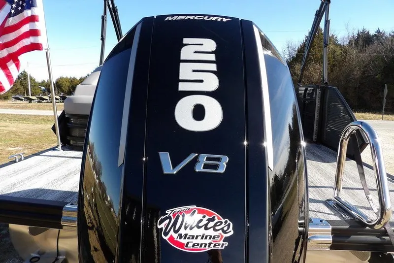 Slide: The Image of 2026 Bennington M Swingback 26 MSB with Mercury 250 V8 engine, American flag visible. - 52