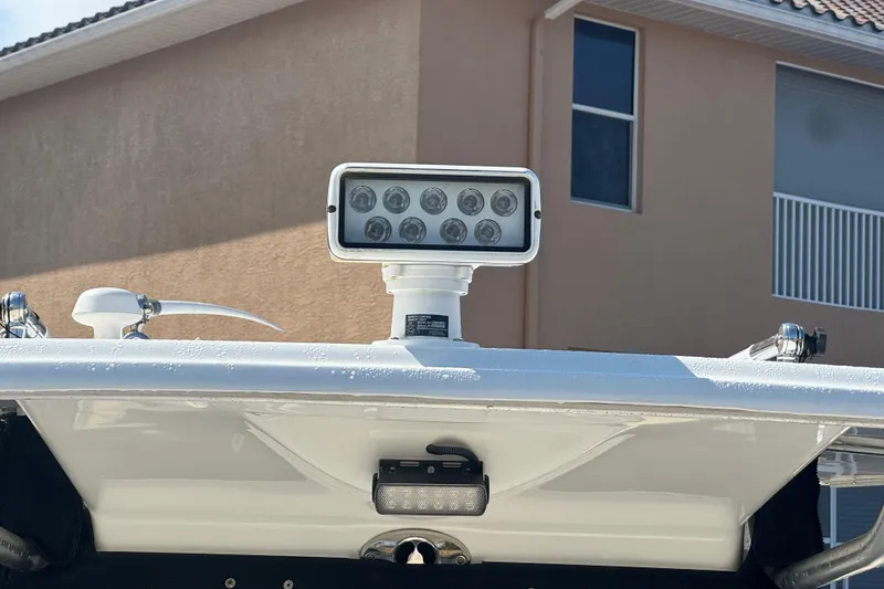 Slide: The Image of 2005 Boston Whaler 320 Outrage boat sink and storage compartment detail. - 18