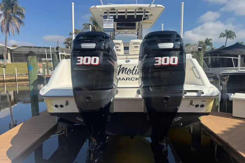 Slide: The Image of Interior of 2005 Boston Whaler 320 Outrage boat bathroom with toilet and sink. - 27