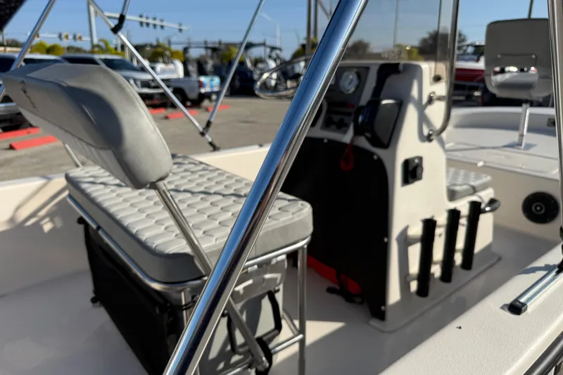 Slide: The Image of 2026 Carolina Skiff E18 JVX CC boat interior with seating and console. - 15