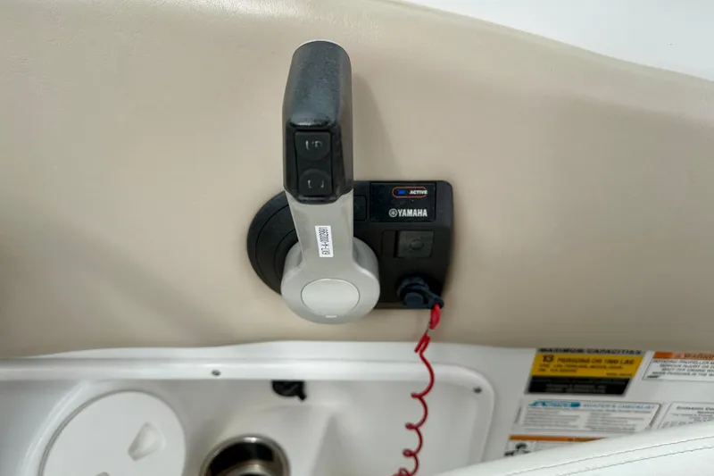 Slide: The Image of Yamaha throttle control on 2012 SouthWind 2600 SD boat dashboard. - 18