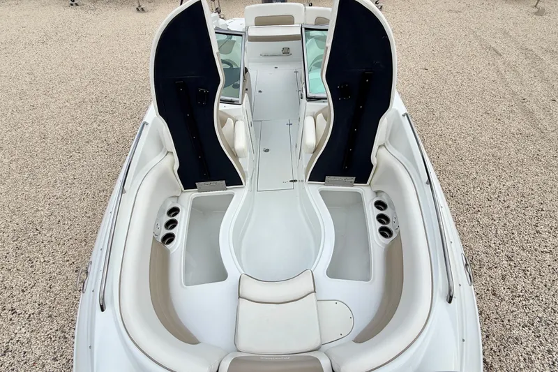Slide: The Image of 2012 SouthWind 2600 SD boat interior with open storage compartments and seating. - 30