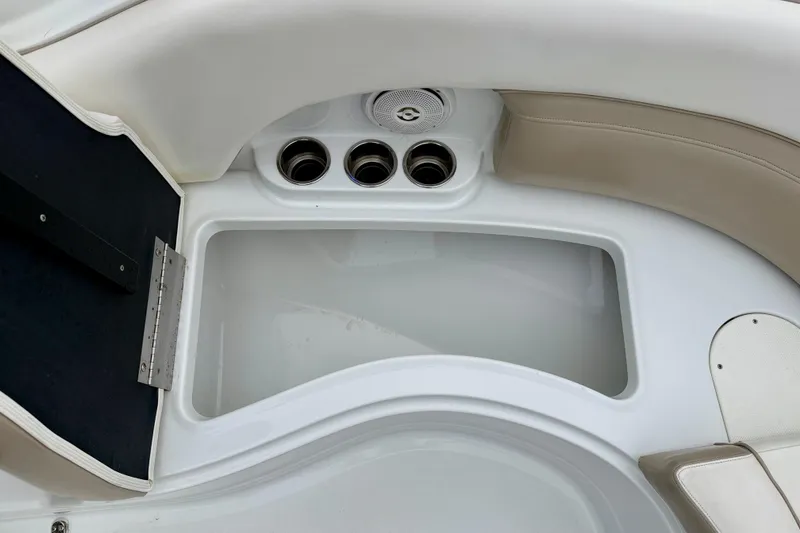 Slide: The Image of Interior of 2012 SouthWind 2600 SD boat with cup holders and seating area. - 31