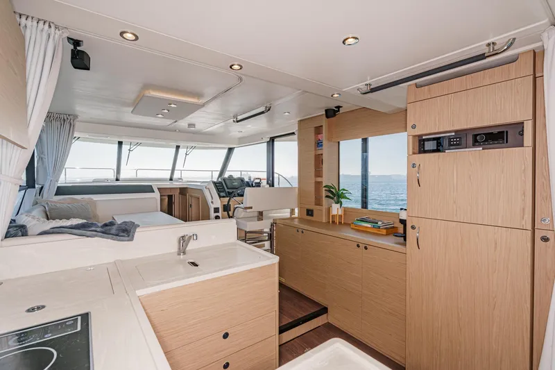 Slide: The Image of Interior of 2025 Beneteau Swift Trawler 41, featuring modern design and ocean view. - 16