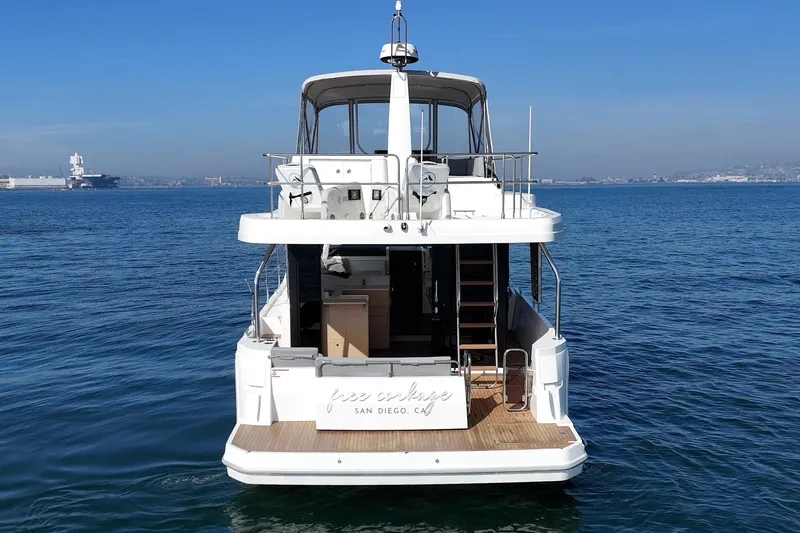 Slide: The Image of 2025 Beneteau Swift Trawler 41 on calm ocean near San Diego. - 4