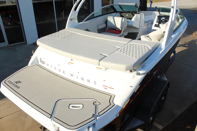 Slide: The Image of 2026 Four Winns H2 Freedom boat with sleek design and spacious seating. - 8