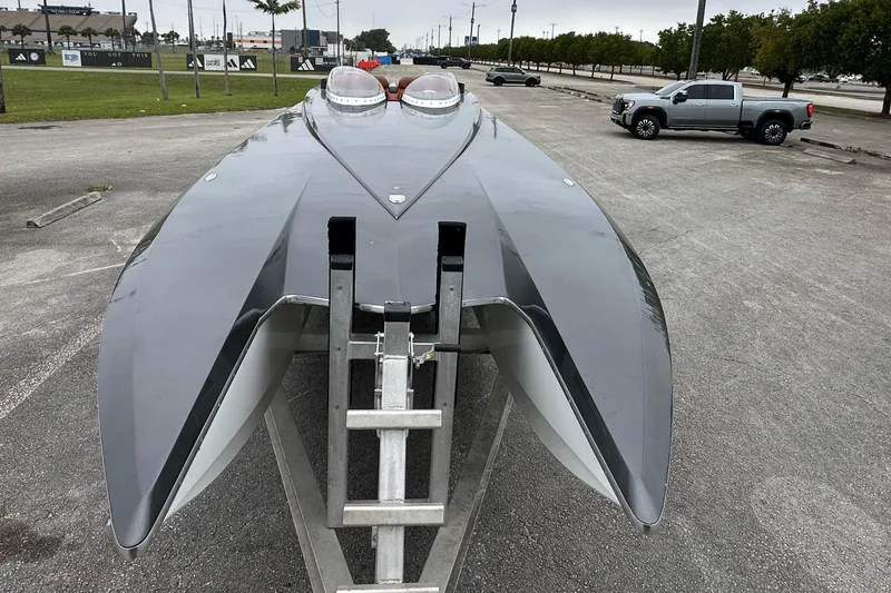 Slide: The Image of 2008 Motion Marine 35 XP boat parked on trailer. - 13