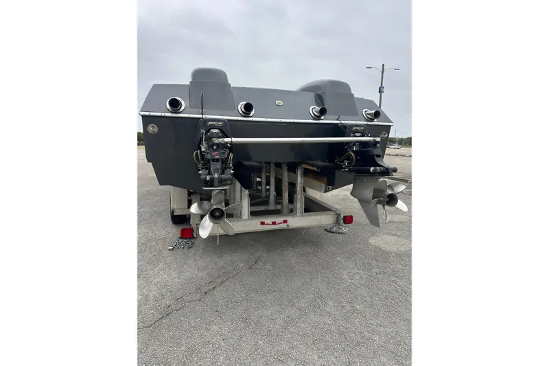 Slide: The Image of Rear view of a 2008 Motion Marine 35 XP boat on trailer. - 3
