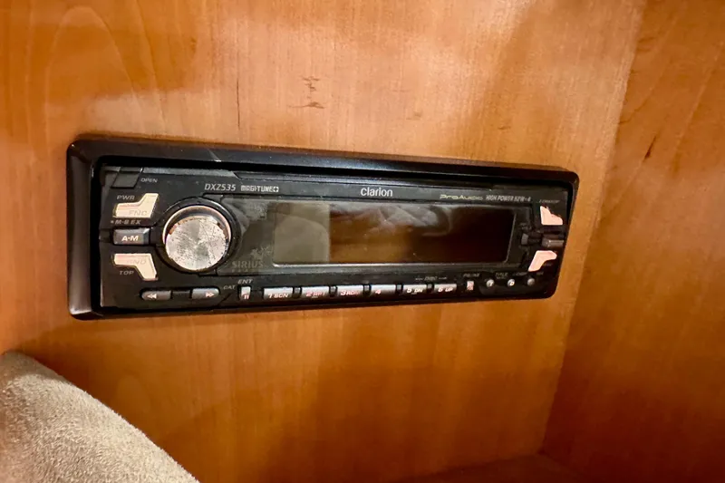 Slide: The Image of Clarion DXZ535 stereo system in 2004 Meridian 580 Pilothouse interior. - 148