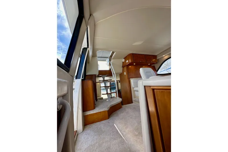 Slide: The Image of Interior of 2004 Meridian 580 Pilothouse yacht with elegant wood and plush seating. - 159