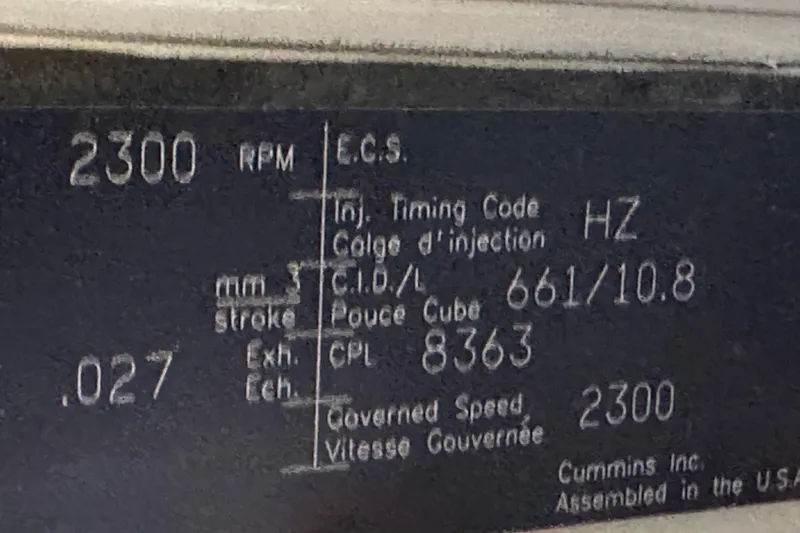 Slide: The Image of Close-up of engine specifications plate for 2004 Meridian 580 Pilothouse. - 35