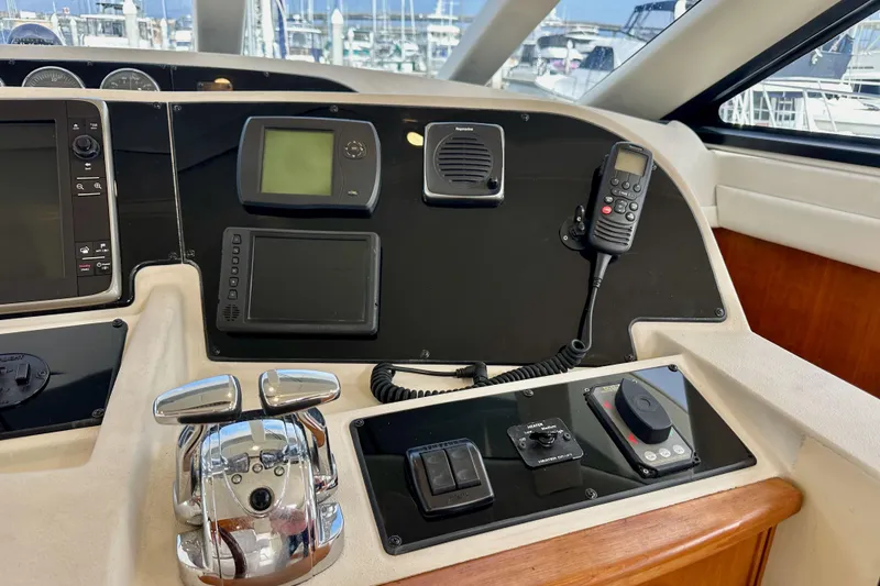 Slide: The Image of Control panel of a 2004 Meridian 580 Pilothouse yacht with navigation equipment. - 59