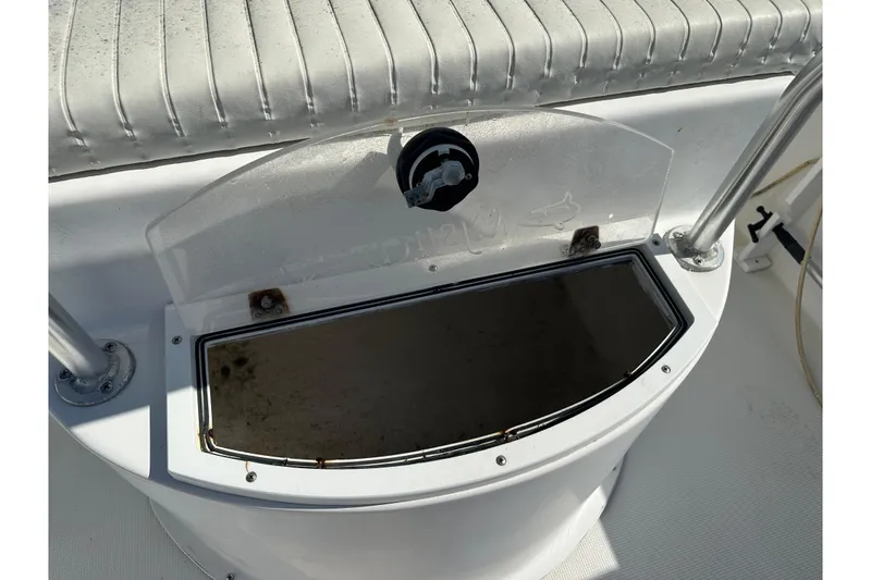 Slide: The Image of 2008 Dusky 278 Center Console boat interior detail with storage compartment. - 21