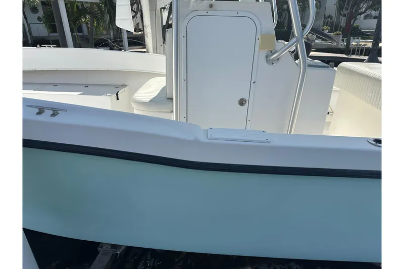 Slide: The Image of 2008 Dusky 278 Center Console boat interior with seating and console view. - 24