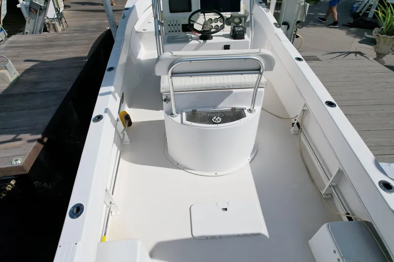 Slide: The Image of 2008 Dusky 278 Center Console boat interior with steering console and seating. - 6