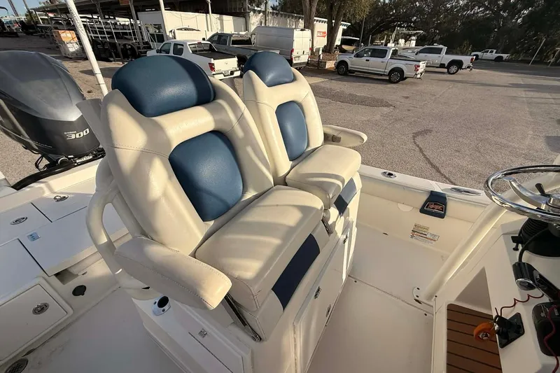 Slide: The Image of 2019 Ranger 2510 Bay Ranger boat seats with blue and white upholstery. - 10