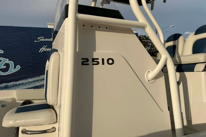 Slide: The Image of 2019 Ranger 2510 Bay Ranger boat interior with seating and model number. - 11