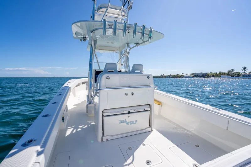Slide: The Image of 2019 SeaVee 340Z boat on open water under clear blue sky. - 20