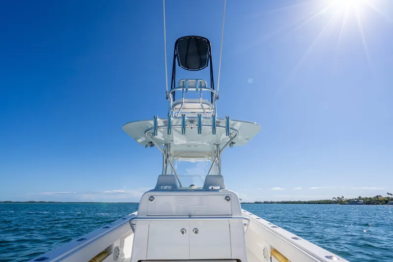 Slide: The Image of 2019 SeaVee 340Z boat on open water under clear blue sky. - 22
