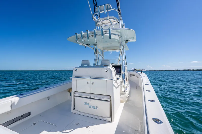Slide: The Image of 2019 SeaVee 340Z boat on open water under clear blue sky. - 23