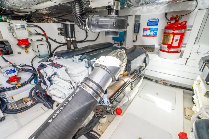 Slide: The Image of Engine room of 2018 Princess F49 yacht with Volvo Penta engine and safety equipment. - 57