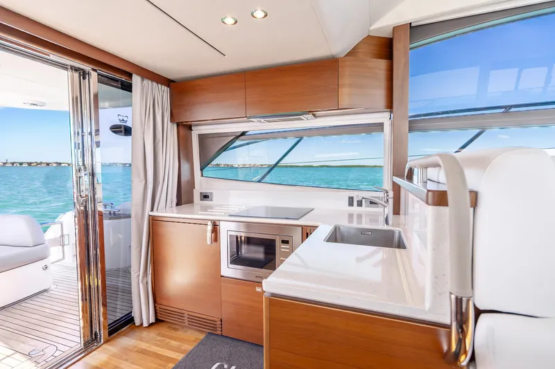 Slide: The Image of Luxurious interior of 2018 Princess F49 yacht with modern kitchen and ocean view. - 28