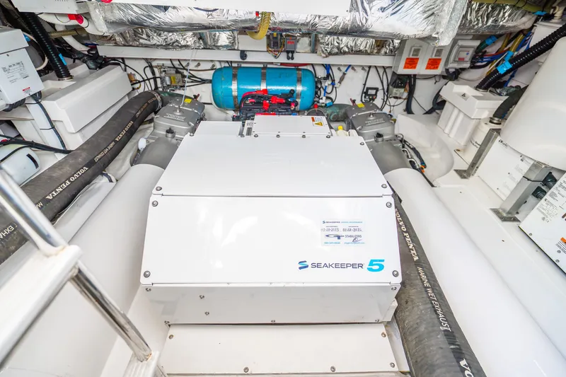 Slide: The Image of Engine room of 2018 Princess F49 yacht featuring Seakeeper 5 stabilizer system. - 59