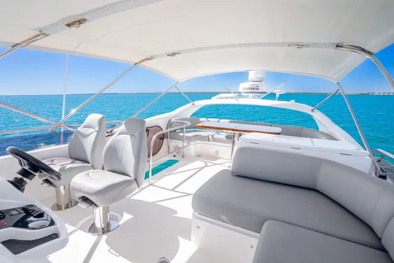 Slide: The Image of Luxurious 2018 Princess F49 yacht interior with elegant seating and ocean view. - 54
