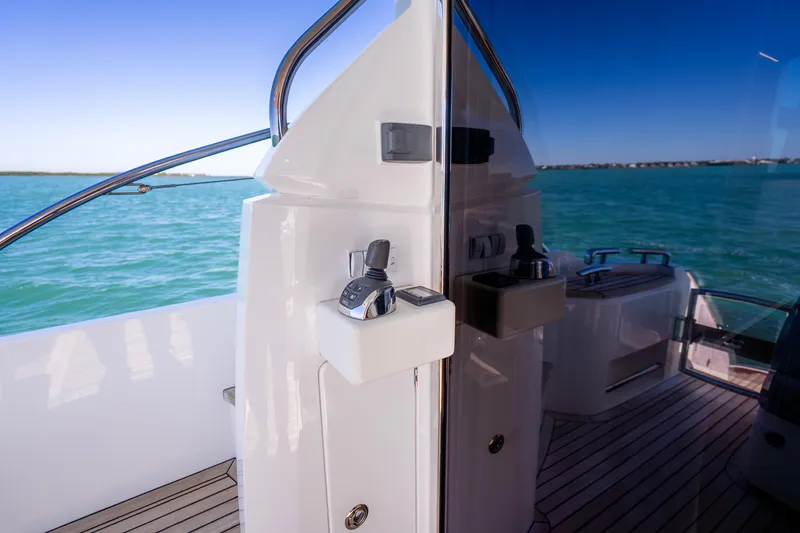 Slide: The Image of 2018 Princess F49 yacht deck with ocean view and modern controls. - 47