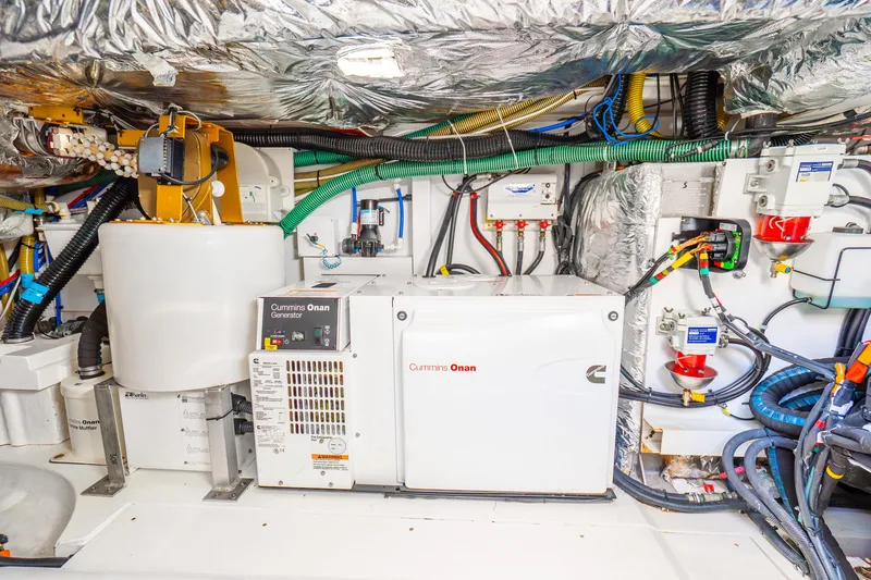 Slide: The Image of Engine room of 2018 Princess F49 yacht with Cummins Onan generator and wiring. - 61