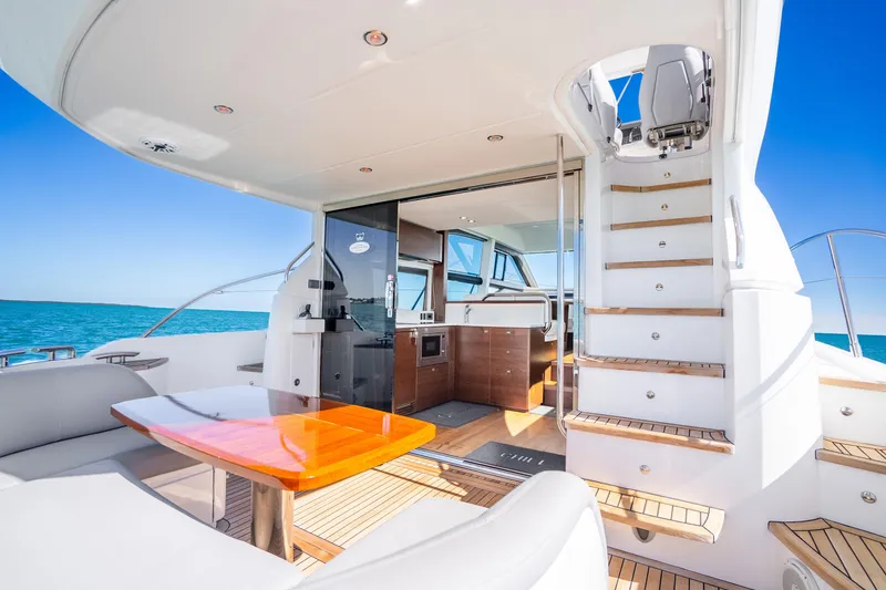 Slide: The Image of Luxurious 2018 Princess F49 yacht interior with elegant seating and ocean view. - 45