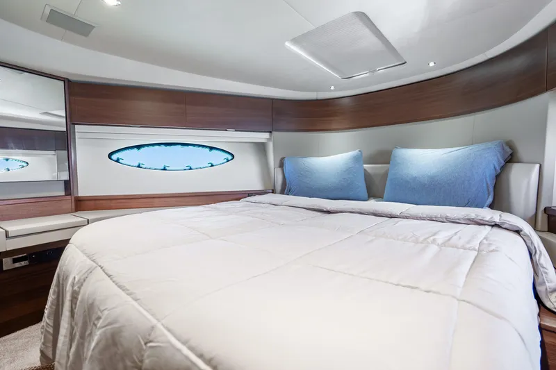 Slide: The Image of Luxurious bedroom interior of 2018 Princess F49 yacht with modern design and cozy bedding. - 37