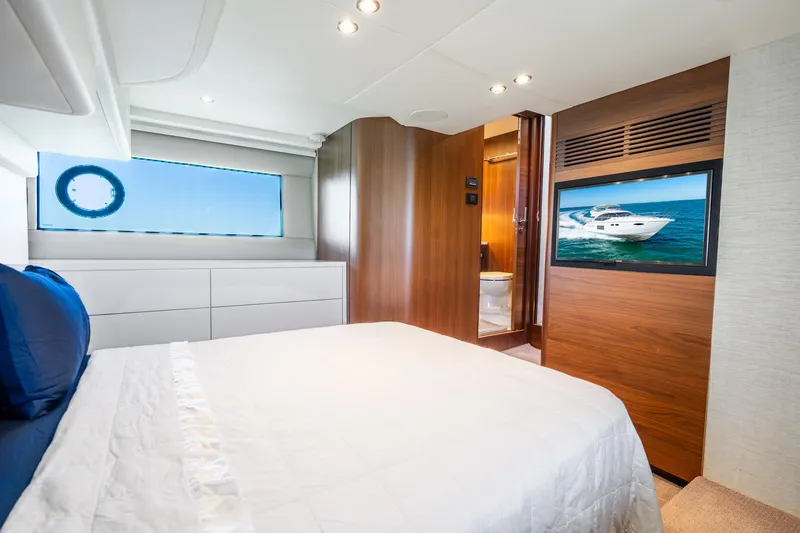 Slide: The Image of Luxurious 2018 Princess F49 yacht bedroom with modern decor and ocean view. - 32