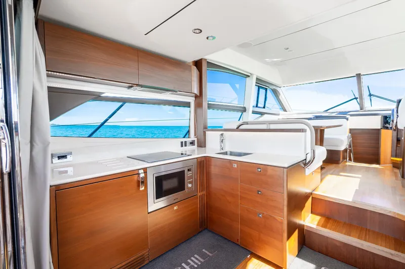 Slide: The Image of Luxurious interior of 2018 Princess F49 yacht with modern kitchen and ocean view. - 27