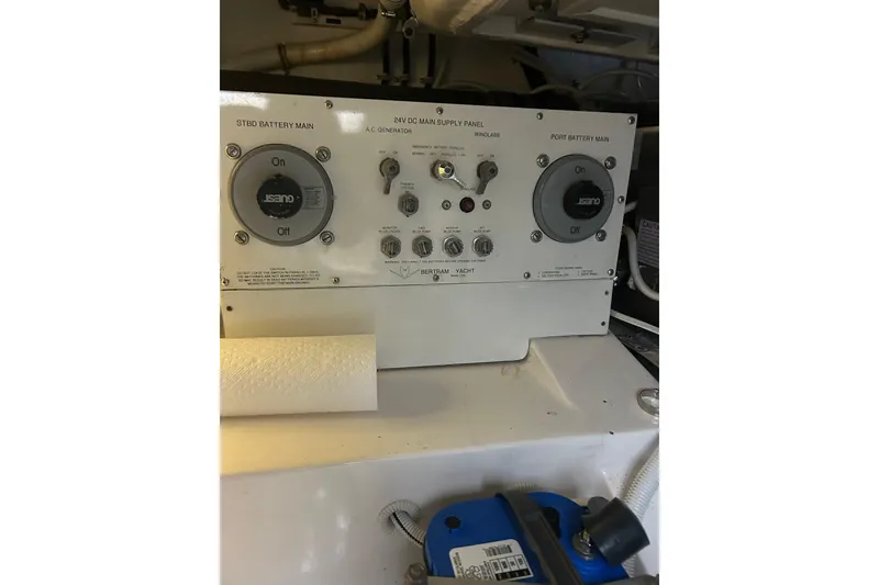 Slide: The Image of Electrical panel of a 2005 Bertram 390 Convertible yacht, featuring battery controls. - 33