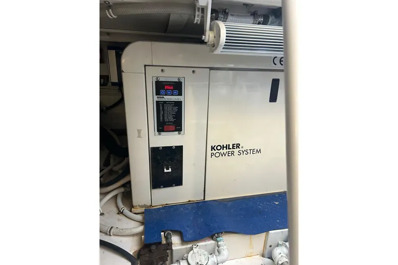 Slide: The Image of Kohler power system in 2005 Bertram 390 Convertible engine room. - 34