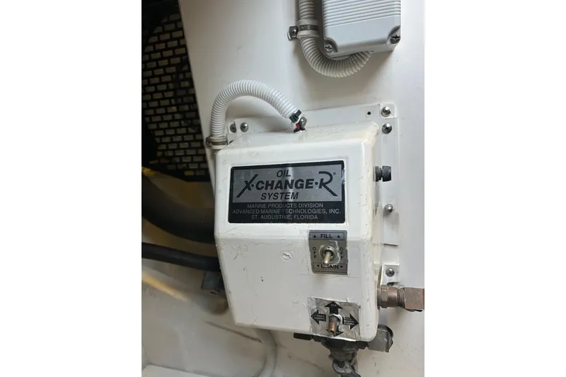 Slide: The Image of Oil X-Change-R system in 2005 Bertram 390 Convertible engine room. - 35