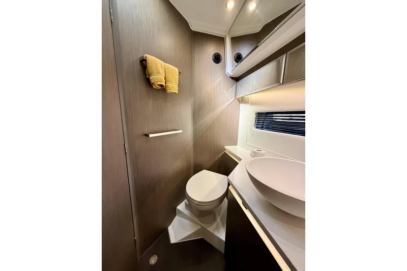Slide: The Image of 2024 Jeanneau NC 1295 Fly bathroom with modern fixtures and elegant design. - 35