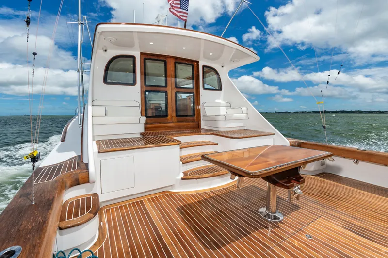 Slide: The Image of 2019 Jarrett Bay 67 Custom yacht deck with wooden finishes. - 10