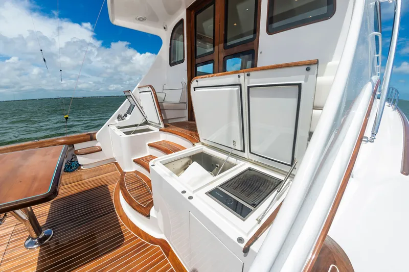 Slide: The Image of 2019 Jarrett Bay 67 Custom yacht deck with open storage. - 13