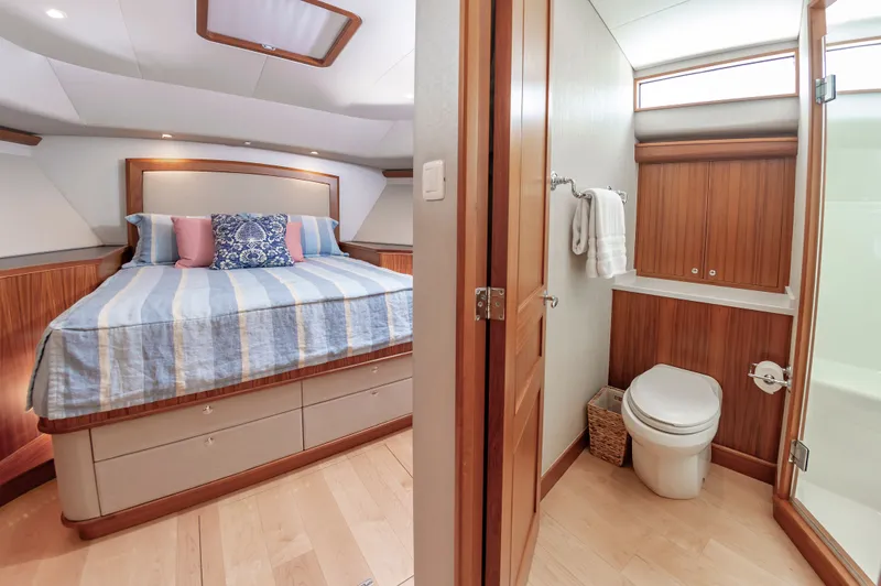 Slide: The Image of Luxurious bedroom and bathroom on Jarrett Bay 67 Custom yacht, 2019 model. - 31