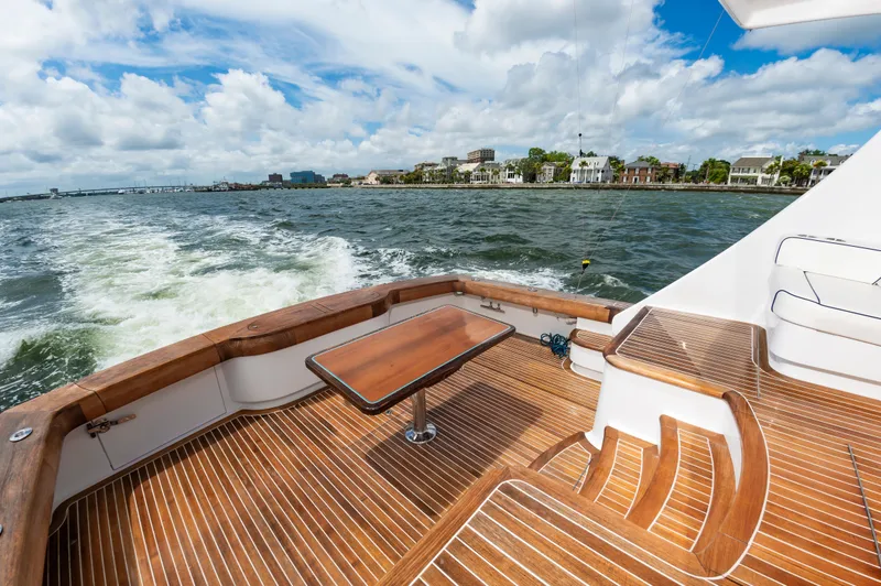 Slide: The Image of 2019 Jarrett Bay 67 Custom yacht deck with scenic waterfront view. - 7