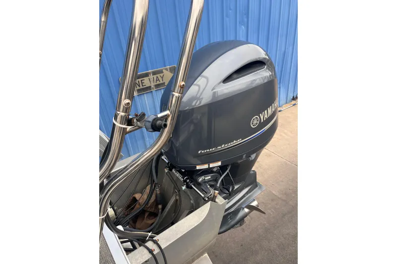 Slide: The Image of 2016 SunChaser Classic Fish 8522 with Yamaha four-stroke outboard motor. - 22