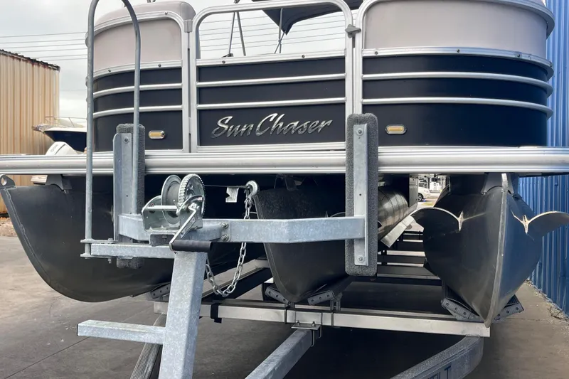 Slide: The Image of 2016 SunChaser Classic Fish 8522 Cruise-N-Fish pontoon boat on trailer. - 24