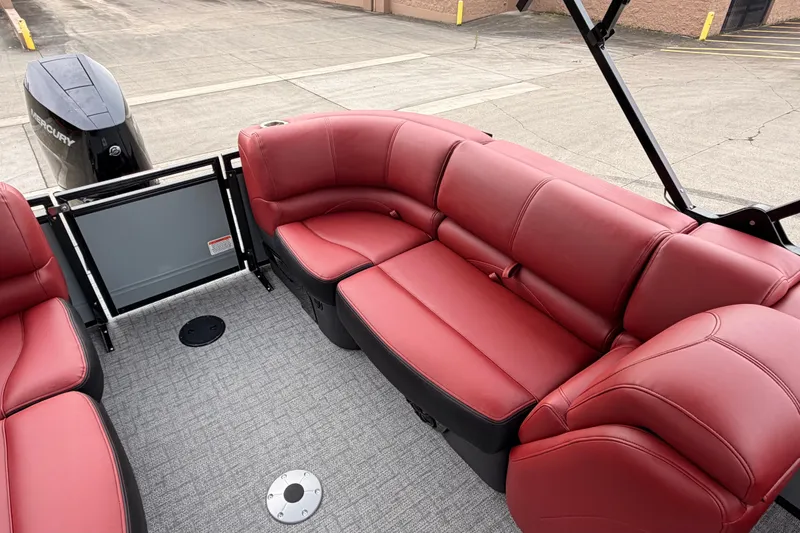 Slide: The Image of Luxurious red seating on 2026 Regency 250 DL boat, featuring spacious layout and modern design. - 5