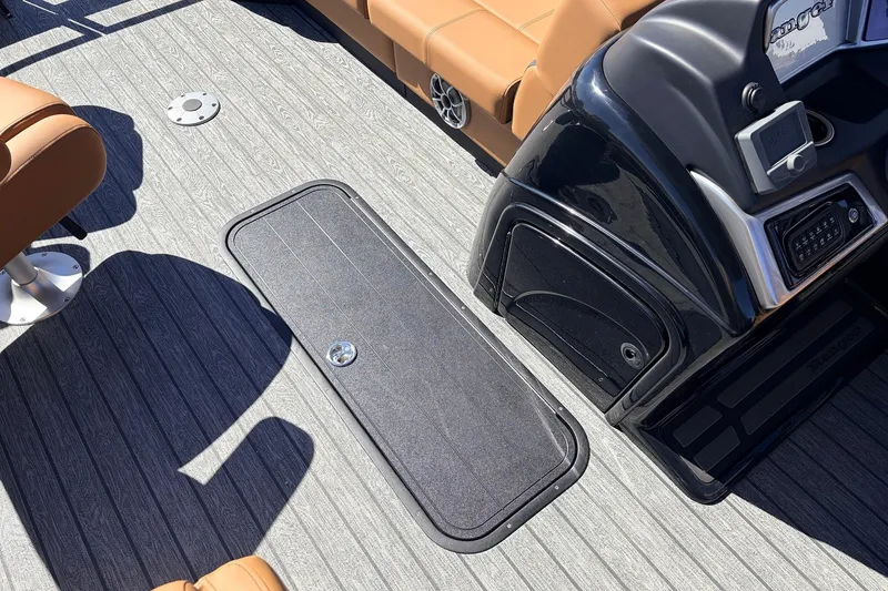 Slide: The Image of 2026 Ranger 223FC boat interior with sleek flooring and modern console design. - 19