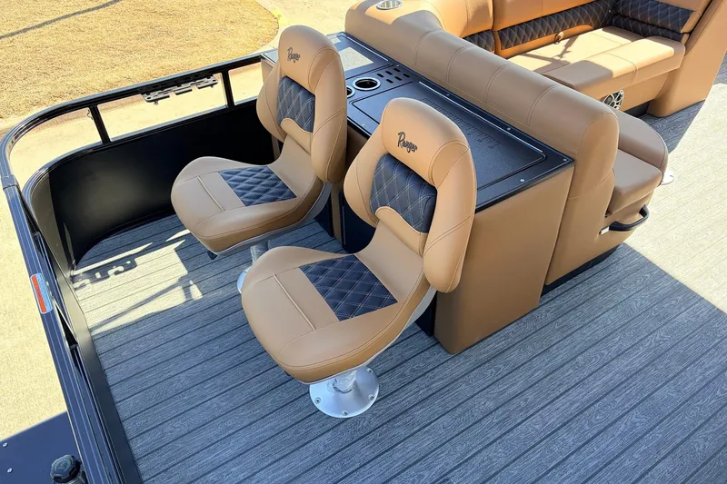 Slide: The Image of 2026 Ranger 223FC boat interior with tan and black seating, featuring stylish design. - 41