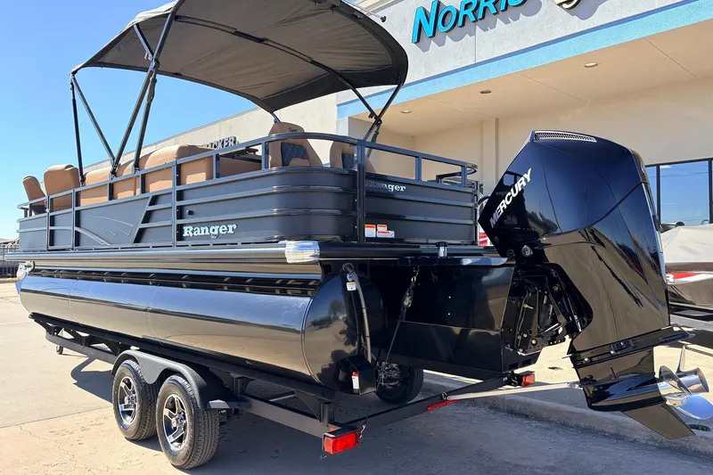 Slide: The Image of 2026 Ranger 223FC pontoon boat with Mercury outboard motor on trailer. - 8