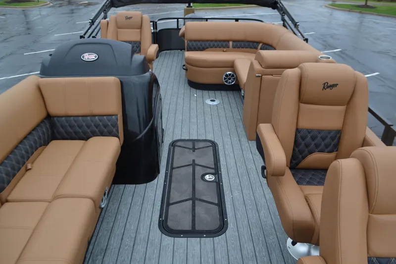 Slide: The Image of Luxurious interior of 2026 Ranger 223FC boat with tan leather seating and sleek design. - 5